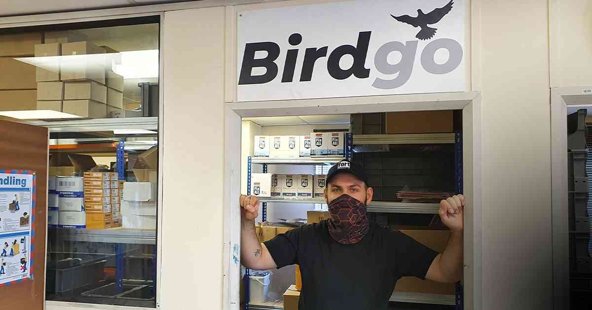 birdgo category feature image birdgo employee in front of sign